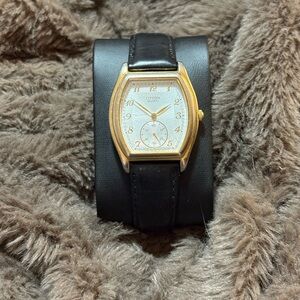 Citizen Gold Case with Black Leather Strap Watch